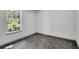 Bedroom featuring neutral walls, carpet floors, and a sunlit window at 90 Lake Avalon Ct, Dallas, GA 30157