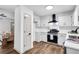 Bright kitchen with stainless steel appliances, white cabinets and lots of natural light at 90 Lake Avalon Ct, Dallas, GA 30157
