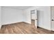 Clean room with wood flooring and white walls, perfect as a blank slate at 90 Lake Avalon Ct, Dallas, GA 30157