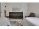 Shared bedroom showcasing two twin beds, a dresser, and a comfortable sitting chair with great lighting at 1105 Sterling Brooke Dr, Alpharetta, GA 30022