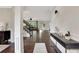Open entryway featuring hardwood floors, staircase, and console table with decorative items at 1105 Sterling Brooke Dr, Alpharetta, GA 30022
