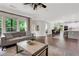 Open concept layout with living room, dining area, and kitchen filled with natural light at 1105 Sterling Brooke Dr, Alpharetta, GA 30022