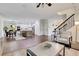 Open concept layout with living room, dining area, and kitchen filled with natural light at 1105 Sterling Brooke Dr, Alpharetta, GA 30022