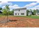 Spacious backyard with unfinished home and green grass at 4563 Sweetlake Court Sw, Mableton, GA 30127