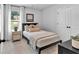 Cozy bedroom with neutral tones, natural light, and a closet for ample storage at 4563 Sweetlake Court Sw, Mableton, GA 30127