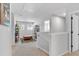 Open and airy loft area with carpet flooring, neutral paint, and views of the exterior at 4563 Sweetlake Court Sw, Mableton, GA 30127