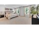 Spacious primary bedroom with large windows, neutral tones, and ample natural light at 4563 Sweetlake Court Sw, Mableton, GA 30127