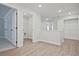 Bright hallway showcases modern fixtures, neutral paint, and durable flooring at 907 Agate Ln, Lawrenceville, GA 30043
