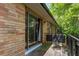 Brick apartment balcony with metal privacy screen at 115 Biscayne Nw Dr # E3, Atlanta, GA 30309