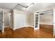 Spacious bedroom with hardwood floors, white trim, and double closets at 115 Biscayne Nw Dr # E3, Atlanta, GA 30309
