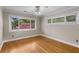 Bright bedroom features two windows and hardwood floors at 115 Biscayne Nw Dr # E3, Atlanta, GA 30309