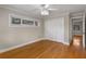Cozy bedroom with hardwood floors and a spacious closet at 115 Biscayne Nw Dr # E3, Atlanta, GA 30309