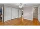 Bedroom featuring a spacious closet and an adjoining bathroom at 115 Biscayne Nw Dr # E3, Atlanta, GA 30309