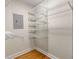 Walk-in closet boasts an adjustable shelving system at 115 Biscayne Nw Dr # E3, Atlanta, GA 30309