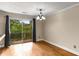 Dining room with sliding glass doors to balcony at 115 Biscayne Nw Dr # E3, Atlanta, GA 30309