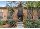 Attractive brick condo building exterior with stone accents and landscaping at 115 Biscayne Nw Dr # E3, Atlanta, GA 30309