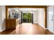 Open-concept living room and dining area with hardwood floors at 115 Biscayne Nw Dr # E3, Atlanta, GA 30309