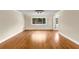 Open living area with hardwood floors and neutral paint at 115 Biscayne Nw Dr # E3, Atlanta, GA 30309