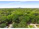 An aerial view showcases a lush green landscape with the city skyline in the distance, highlighting the neighborhood's location at 345 Adelle Se St, Atlanta, GA 30315
