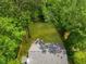Spacious backyard with lush lawn, bordered by a wooden fence and mature trees, offering privacy and outdoor space at 345 Adelle Se St, Atlanta, GA 30315