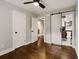 Bedroom featuring a sliding barn door to the bathroom with modern black and white tiles at 345 Adelle Se St, Atlanta, GA 30315