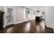 Hardwood floors throughout the living space that connects the living room and kitchen spaces at 345 Adelle Se St, Atlanta, GA 30315