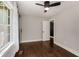 Enclosed porch with red tile flooring, black metal chairs, and white brick columns at 345 Adelle Se St, Atlanta, GA 30315