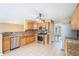 Well-equipped kitchen with stainless steel appliances, tile flooring, and stylish granite countertops at 555 Sydney Crest Ln, Lawrenceville, GA 30046