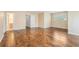 Spacious living area with hardwood flooring, lots of natural light and neutral wall colors at 555 Sydney Crest Ln, Lawrenceville, GA 30046