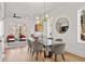 Elegant dining room with modern light fixture, dining table and great natural light at 1836 Memorial Dr # 303, Atlanta, GA 30317