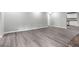 Spacious basement featuring modern flooring and access to kitchen area at 2487 Highland Se Dr, Conyers, GA 30013