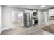 Kitchen featuring stainless steel appliances and views to other living spaces at 2487 Highland Se Dr, Conyers, GA 30013