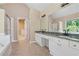 Bathroom with double vanity, granite countertops, and walk-in shower at 3355 Golfe Links Dr, Snellville, GA 30039