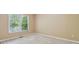 Cozy bedroom with natural light and plush carpeting at 3355 Golfe Links Dr, Snellville, GA 30039