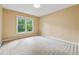 Neutral bedroom with one window letting in plenty of natural light at 3355 Golfe Links Dr, Snellville, GA 30039