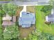 The aerial view showcases the roof, yard size, driveway, and landscaping at 3562 Clubland Dr, Marietta, GA 30068
