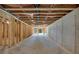 Unfinished basement space ready for customization with exposed beams and concrete floor at 3562 Clubland Dr, Marietta, GA 30068