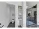 Bathroom featuring a glass shower, a toilet, and built-in shelving for storage at 3562 Clubland Dr, Marietta, GA 30068