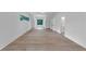 Primary bedroom with hardwood floors, dormer windows, and a bathroom entrance at 3562 Clubland Dr, Marietta, GA 30068