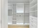 Walk-in closet contains custom shelving and plenty of storage space at 3562 Clubland Dr, Marietta, GA 30068