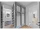 A walk-in closet offers custom shelving and convenient access to the bathroom at 3562 Clubland Dr, Marietta, GA 30068