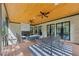 View of covered patio with outdoor seating, dining table, and wood ceiling at 3562 Clubland Dr, Marietta, GA 30068