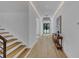 Bright foyer features hardwood floors, recessed lighting, a decorative console table, and modern finishes at 3562 Clubland Dr, Marietta, GA 30068