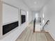 A modern hallway features light wood floors and contemporary artwork at 3562 Clubland Dr, Marietta, GA 30068