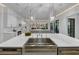The kitchen boasts a large island with a stainless steel sink and ample counter space at 3562 Clubland Dr, Marietta, GA 30068