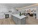 Modern kitchen featuring a large island, stainless steel appliances, and an open layout to the living room at 3562 Clubland Dr, Marietta, GA 30068