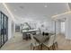 Spacious kitchen featuring an island, white cabinets, modern appliances, and an adjacent dining area at 3562 Clubland Dr, Marietta, GA 30068