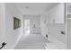 A spacious laundry room features ample storage, a sink, and modern finishes at 3562 Clubland Dr, Marietta, GA 30068
