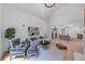 This open-concept living room connects to the kitchen and features lots of natural light at 3562 Clubland Dr, Marietta, GA 30068