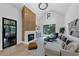 Bright living room featuring a fireplace, large windows for natural light, and modern decor at 3562 Clubland Dr, Marietta, GA 30068